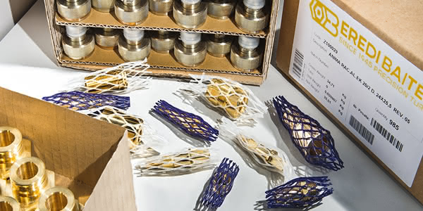 Componenti metallici imballati con sistemi conta pezzi e misuratori di peso presso Eredi Baitelli, per una logistica di precisione..